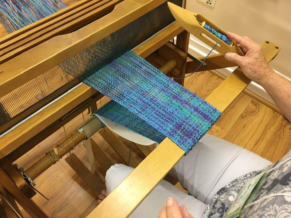 weaving on a floor loom